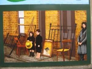 Arthur Kavanagh's Mural based on photographs of evictions can be seen on Merchant's Road